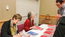 Betty Azar (right) and co-author Stacey Hagen sign books at the 2014 TESOL conference.