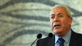 Burhan Ghalioun, head of the opposition Syrian National Council, speaks during a news conference with Italy's Foreign Minister Giulio Terzi di Sant'Agata in Rome, May 13, 2012. 