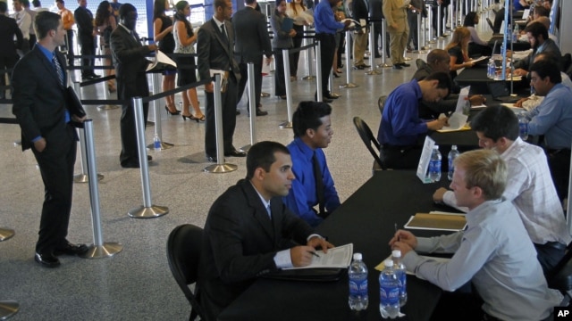 Job applicants receive interviews by Florida Marlins staff at Marlins Park in Miami, Florida, October 24, 2012.