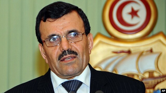New prime minister of Tunisia, Ali Larayedh, delivers a speech during a press conference in Tunis,  Feb. 22, 2013.