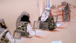 In this pool photo of a sketch by courtroom artist Janet Hamlin and reviewed by the U.S. Department of Defense, three of the five Sept. 11 defendants, from left, Ramzi Binalshibh, Walid bin Attash and the self-proclaimed terrorist mastermind Khalid Sheikh