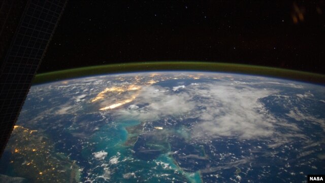 A view of Earth from the International Space Station flying above the Caribbean Sea in the early morning hours of July 15, 2014. (NASA astronaut Reid Wiseman photographer)