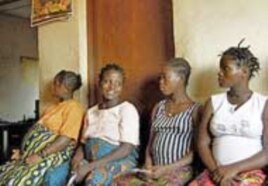 Pregnant women waiting to see nurse at Kroo Bay Community Health Centre in Freetown, Sierra Leone