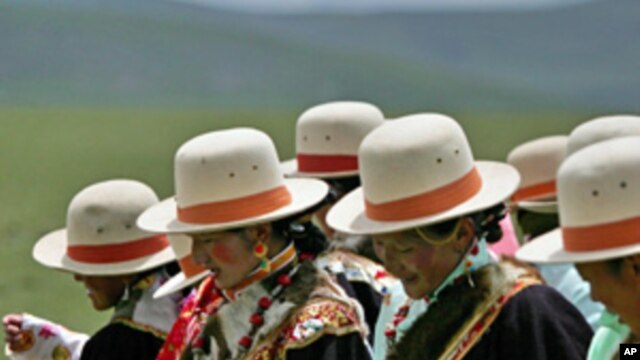 Tibetan women dance in the grasslands of their small village in the district of Naqu, Tibet (file photo)