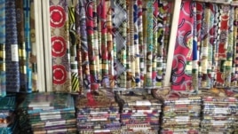 Foreign textile fabrics and materials in a Nigerian shop, December 5, 2012. (I. Kure - for VOA)