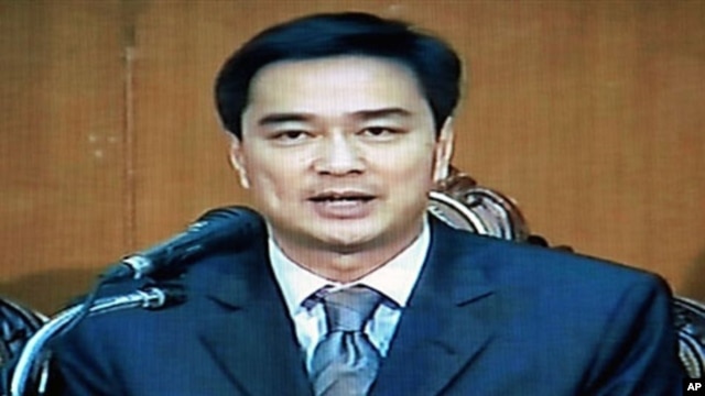 A TV screen grab shows Thai PM Abhisit Vejjajiva announcing a State of emergency in Bangkok on 07 Apr 2010