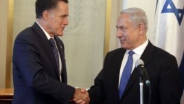 Israeli Prime Minister Benjamin Netanyahu (R) shakes hands with U.S. Republican presidential candidate Mitt Romney during their meeting in Jerusalem July 29, 2012. 