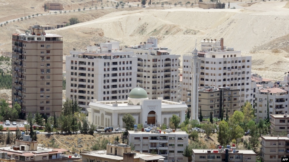Alcuni dei nuovi edifici costruiti a Damasco e venduti agli iraniani. Credits to: Louai Beshara/AFP