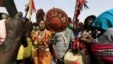 Supporters perform as Sudanese President Omar al-Bashir addresses the crowd during a peace campaign rally in Zalingei in Darfur, April 3, 2016.