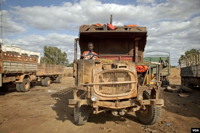 Ali Hassan Abdi drives a truck between Mogadishu and Baidoa. He keeps his truck in a state of disrepair to avoid heavier taxes at al- Shabaab checkpoints, August 24, 2012.