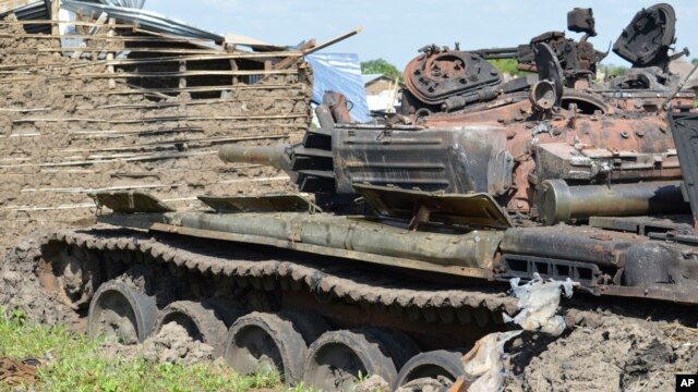 Tanks that have been destroyed during fighting between government and opposition are seen on July 10, 2016, in the Jabel area of Juba, South Sudan, July 16, 2016.