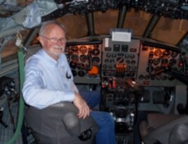 Volunteer Bob Hood in the Comet's restored cockpit.