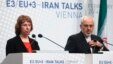European Union foreign policy chief Catherine Ashton (L) and Iranian Foreign Minister Mohammad Javad Zarif deliver a statement after a conference in Vienna, Feb. 20, 2014.