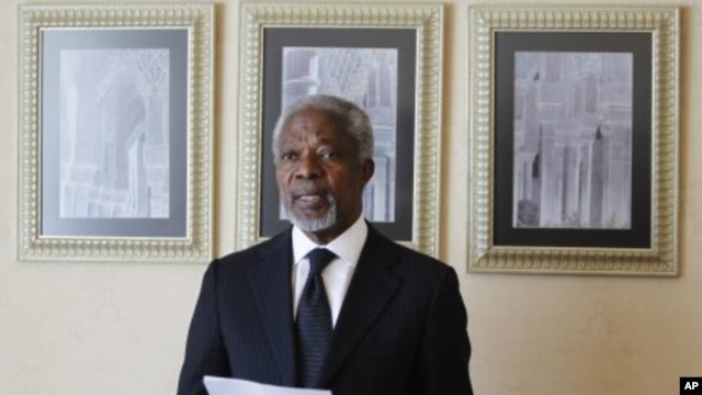 UN-Arab League envoy Kofi Annan reads a statement after his meeting with Syria's President Bashar al-Assad in Damascus, March 11, 2012. 