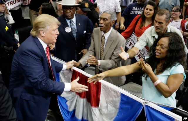 Republican presidential hopeful Donald Trump shakes hands with supporters after speaking at a campaign event in Dallas, Texas, Sept. 14, 2015.