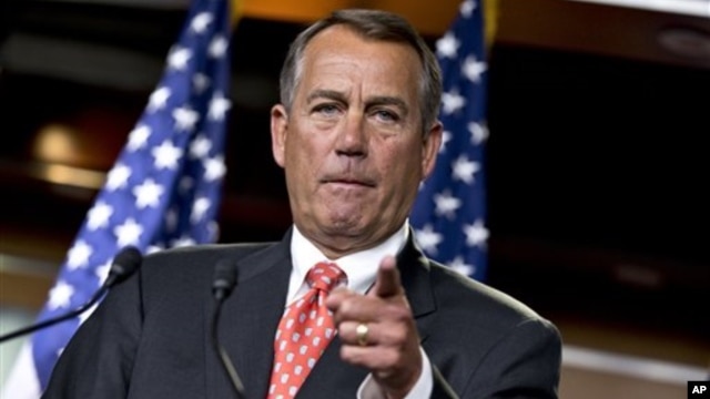 House Speaker John Boehner of Ohio gestures as he speaks to reporters after private talks with Treasury Secretary Timothy Geithner about the fiscal cliff negotiations, on Capitol Hill in Washington, November 29, 2012.