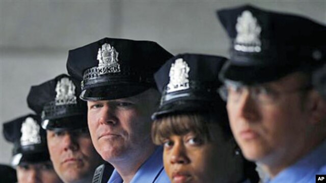 Police officers are briefed for a Philadelphia Police Department Homeland Security Unit emergency preparedness exercise in Philadelphia, May 4, 2011