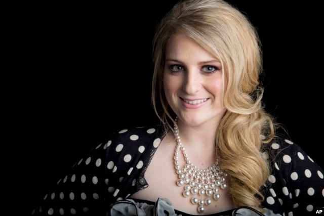 American singer, songwriter and record producer known for the pop single "All About That Bass" Meghan Trainor poses for a portrait, on Aug. 7, 2014 in New York.