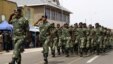 FILE - Soldiers from the Democratic Republic of Congo (DRC) take part in a parade to mark the country's Independence Day through a street in eastern city of Goma, June 30, 2014