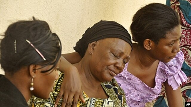 Relatives of victims of university theater gun attack in Kano, northern Nigeria, April 29, 2012.