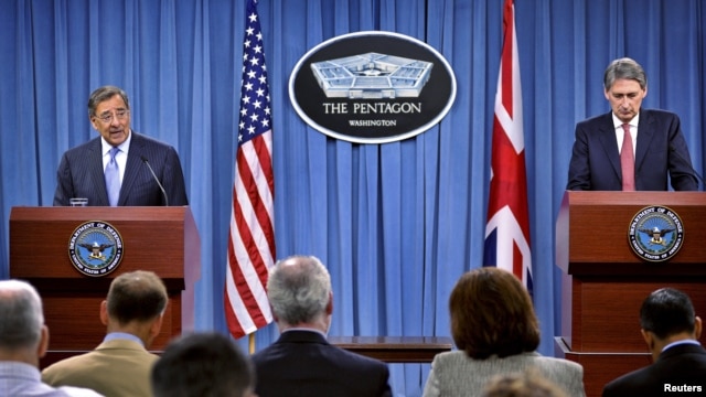 U.S. Secretary of Defense Leon E. Panetta (L) and British Secretary of State for Defense Philip Hammond hold a joint news conference at the Pentagon in Washington, July 18, 2012.  
