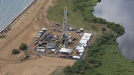 FILE - An aerial view of an oil exploration site in Bulisa district, approximately 244 km (152 miles) northwest of Kampala in this undated handout photo from Tullow Oil Uganda, received by Reuters July 4, 2012. 