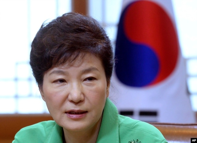 FILE - South Korean President Park Geun-hye speaks during a regular meeting at the presidential house in Seoul, South Korea.