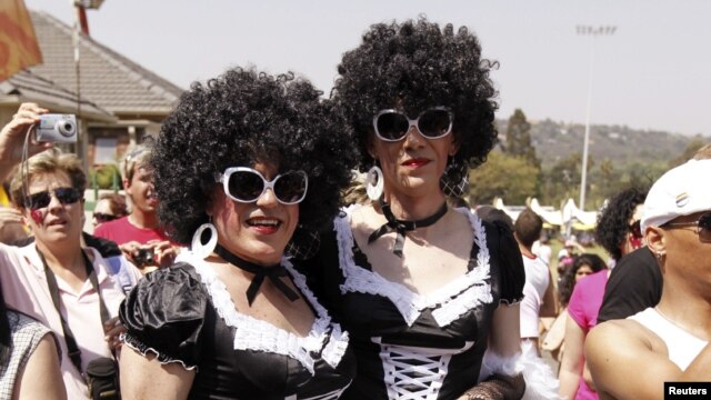 People take part in the Joburg Pride Parade in Johannesburg, South Africa, October 2, 2010. 