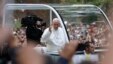 Pope Francis waves to the crowd from his popemobile as it moves through Central Park in New York, Sept. 25, 2015.