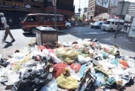 Johannesburg was hit by a strike by municipal workers that resulted in refuse piling up around the city just before the local government polls