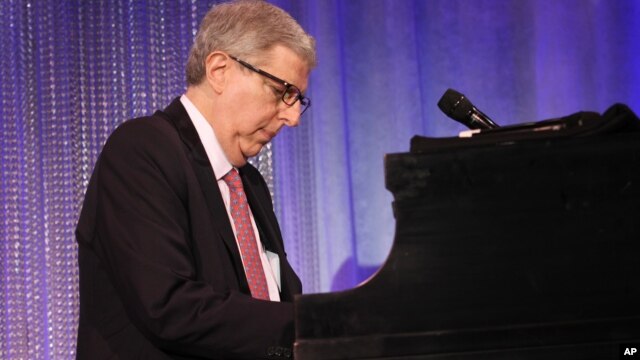 Composer Marvin Hamlisch performs at the Cedars-Sinai Board of Governors Gala at The Beverly Hilton Hotel in Beverly Hills, California, November 8, 2011.