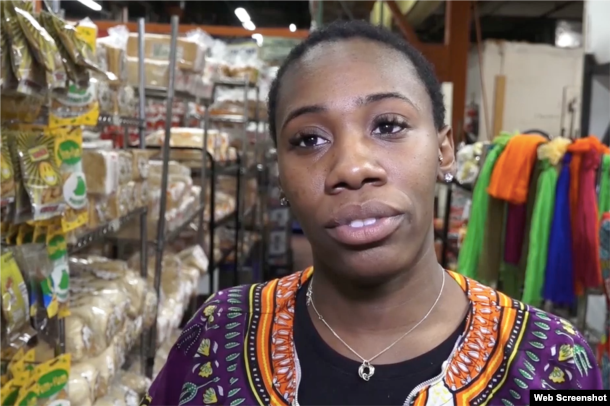 Deandra Harris, a cashier at Gold Coast Trading Company — a West African goods market based in the Bronx, New York, says, "If you do not vote, you're kind of just giving your vote away to whomever does."