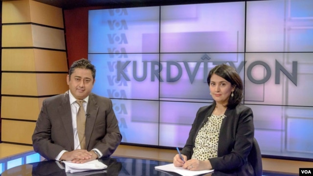 Kurdvizyon hosts Mutlu Civiroglu (L) and Ruken Isik 