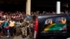Thousands Cheer as Mandela Goes Home for Last Time