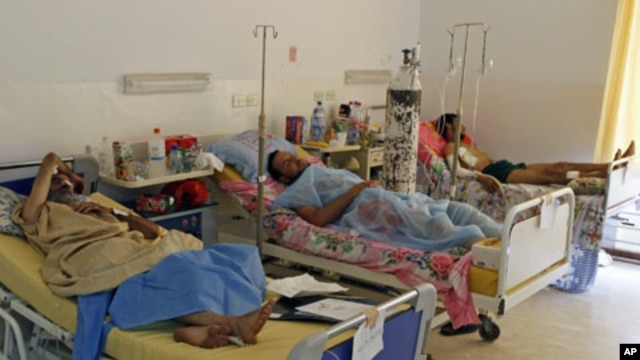 Rebel fighters, who were injured during fighting at Bab al-Aziziya, rest at Maitika Hospital, in Tripoli, Libya, August 27, 2011