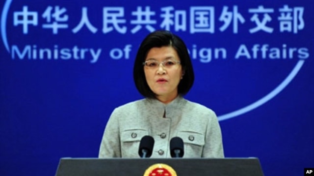 Chinese foreign ministry spokeswoman Jiang Yu responds to questions during a press briefing in Beijing,  March 22, 2011