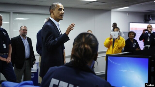 President Barack Obaman hojjettoota dhaaba gargaarsa yeroo hatattamaa kan Federaalaa FEMA waliin