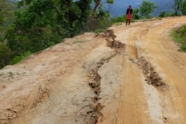 A dirt road above Majigaon in Sindhupolchak district was cracked by the magnitude-7.8 earthquake.