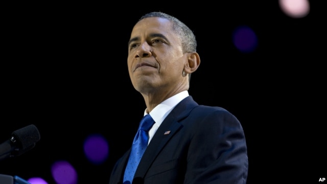 President Barack Obama pauses as he speaks at the election night party at McCormick Place in Chicago, early Wednesday, Nov. 7, 2012.