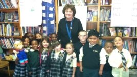 Janine Cerrone with her kindergarten class at Saint Camillus Catholic school in New York. (VOA/A. Phillips)