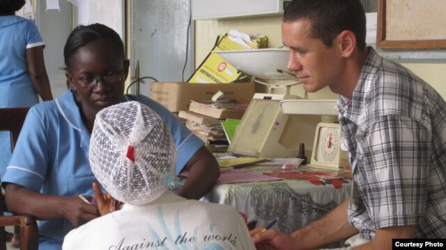  A woman receives information on postpartum depression at Komfo Anokye Teaching Hospital in Kumasi, Ghana.  (Credit: K. Gold, University of Michigan medical School)                             