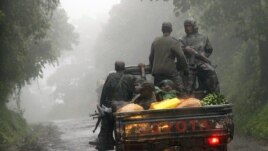 Des rebelles du M23 à Bunagana, près de la frontière ougandaise