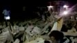 In this image made from video, debris is seen following a fire and explosion at a temple in Kollam, in the southern Indian state of Kerala, early Sunday, April 10, 2016. A number of people were killed and many more injured in a massive fire that broke out in a temple caused by fireworks that had been stored in the temple in preparation for the Hindu new year festival, according to an official. (Asianet News via AP Video)