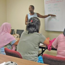 Immigrants attend an English language class at the Refugee Resource Center in Fort Wayne, Indiana.