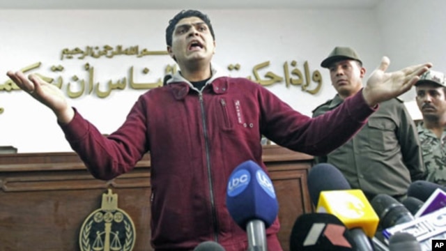 Army doctor Ahmed Adel, who was accused of carrying out a forced virginity test on a female detainee, speaks to the media after being acquitted, in Cairo, Egypt, March 11, 2012.