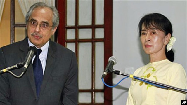 UN special adviser Vijay Nambiar (L) speaks during a news conference following his meeting with Burma's pro-democracy leader Aung San Suu Kyi, at her home in Rangoon, Burma, February 16, 2012.