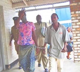 Tiwonge Chimbalanga and Steven Monjeza are taken into custody after celebrating their engagement