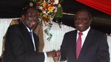 President Robert Mugabe and Prime Minister Morgan Tsvangirai at the constitution signing ceremony