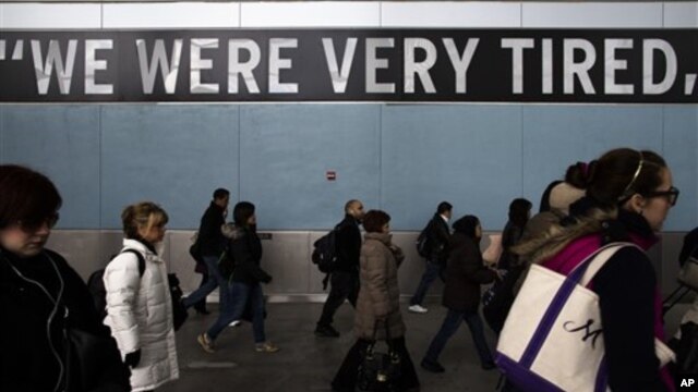 Commuters disembark Staten Island Ferry one week after Superstorm Sandy crashed into the metropolitan area, New York, Nov. 5, 2012.