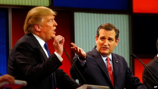 Republican presidential candidates, businessman Donald Trump and Sen. Ted Cruz, R-Texas, argue a point during a Republican presidential primary debate at Fox Theatre, Thursday, March 3, 2016.